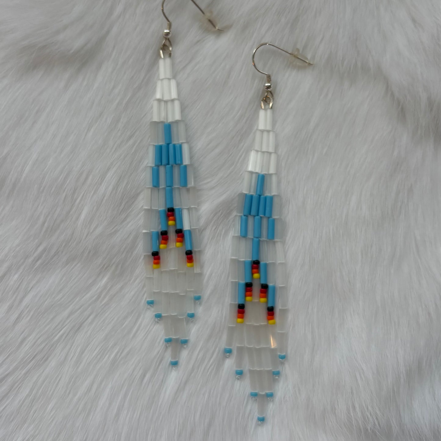 White Thunder Bird Bugle Fringe Earrings