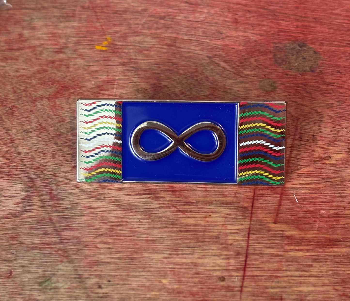Metal Metis Lapel Pin