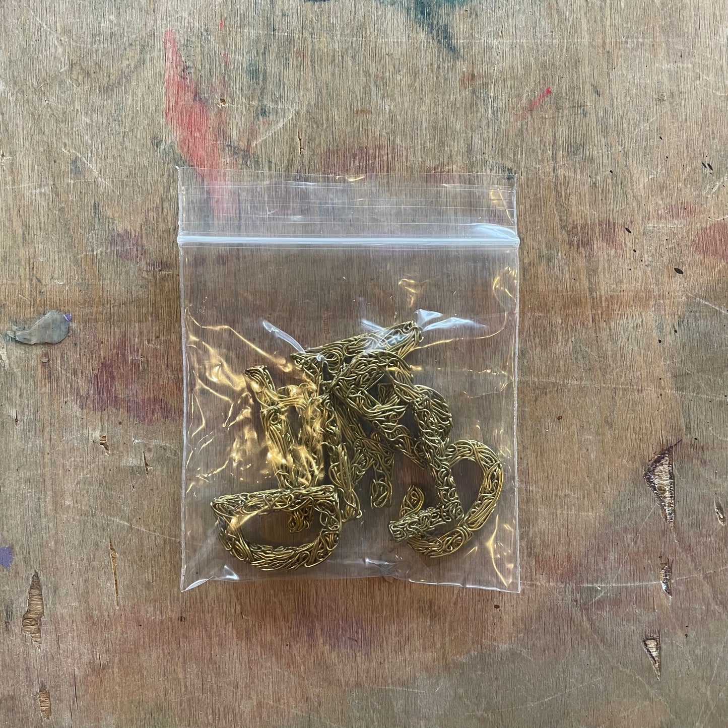 "LAND BACK" Brass Wire Pressed Letter Charms Set