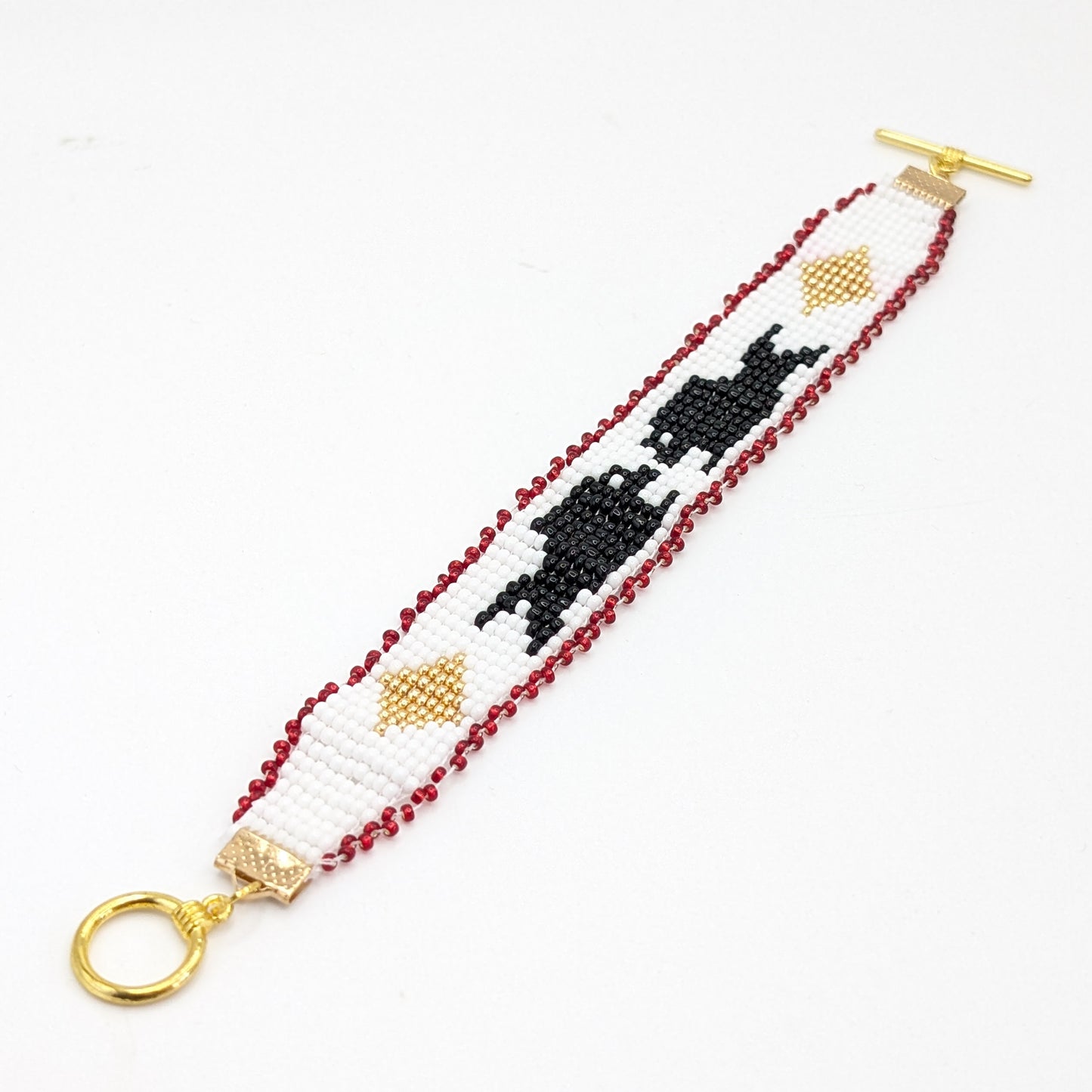 Red Trim Beaded Orca Whale Bracelet with Gold Findings