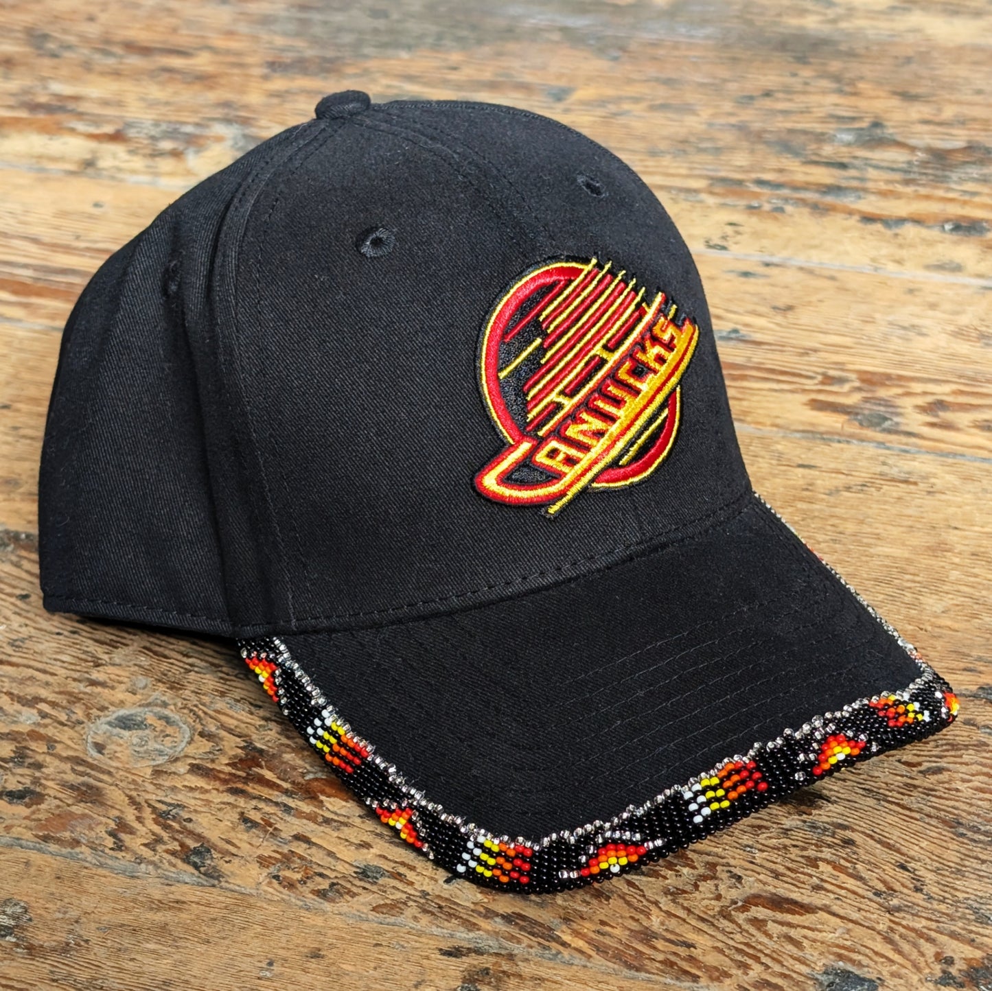 Beaded Black Canucks Baseball Cap with Medicine Colours