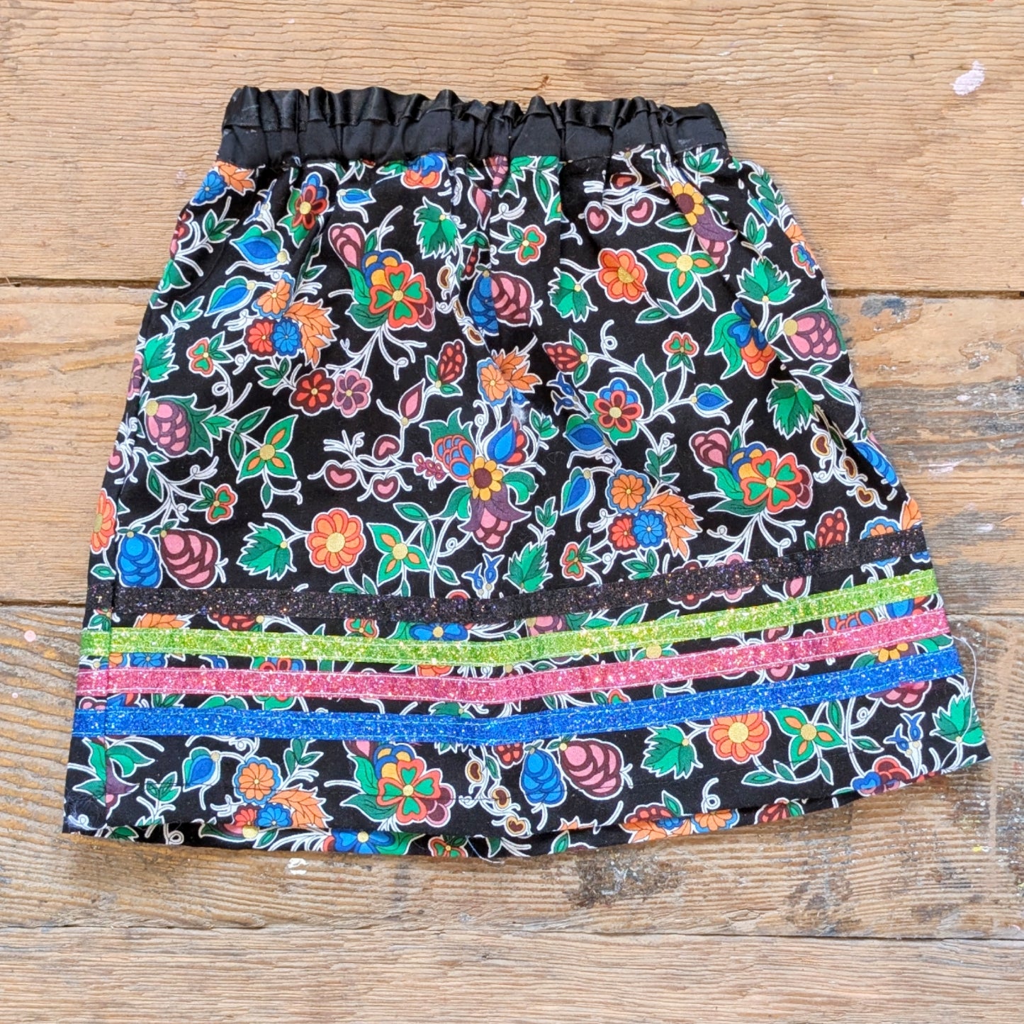 Metis Floral Black Baby's Ribbon Skirt with Full Glitter Ribbon Detail