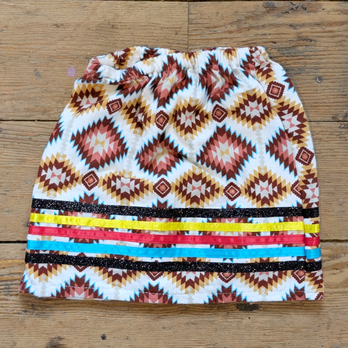 Burgundy & Beige Fleece Baby Ribbon Skirt with Primary Stripes & Black Glitter Accents