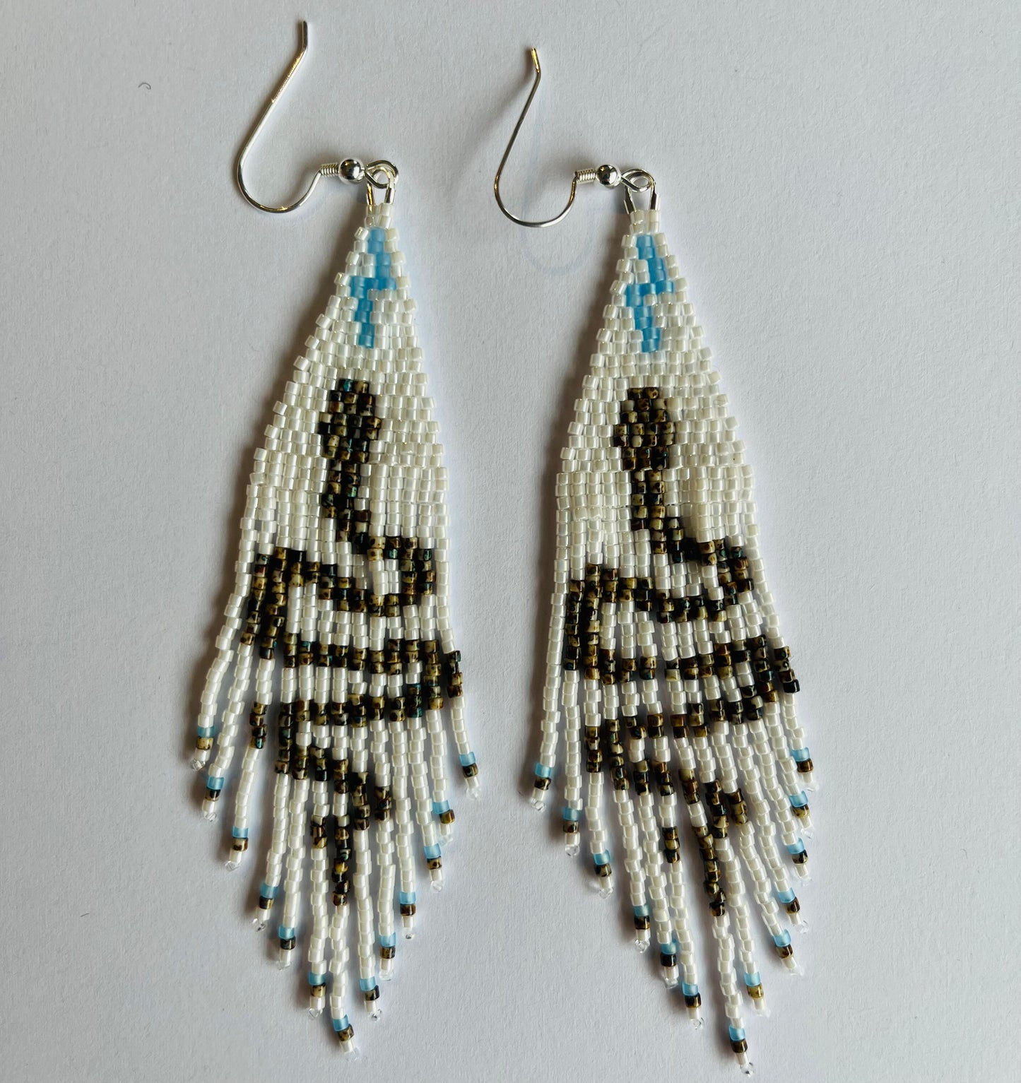 Snake Fringe Earrings in Browns and White Background