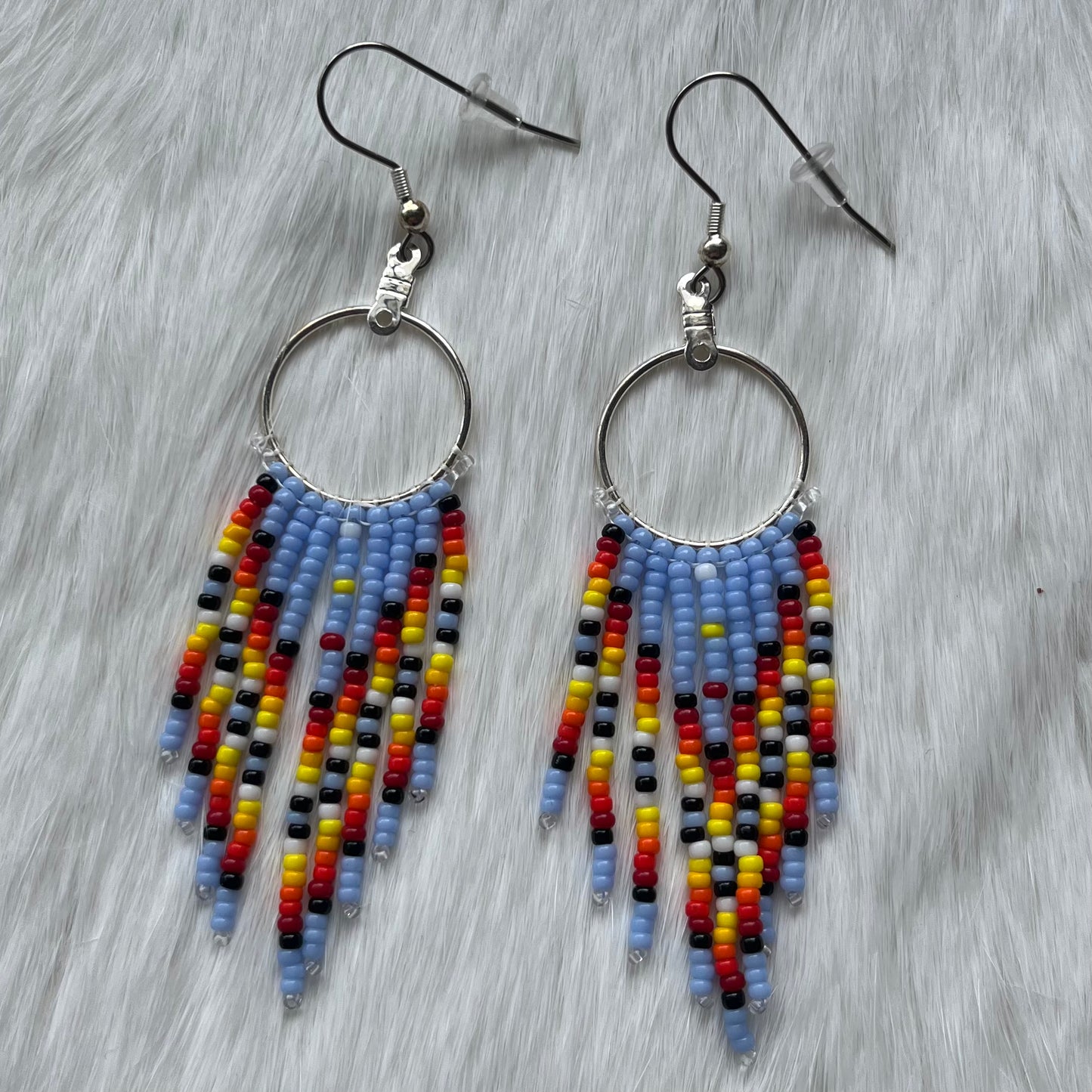20 mm silver plated hoops with pale blue and fire coloured fringe