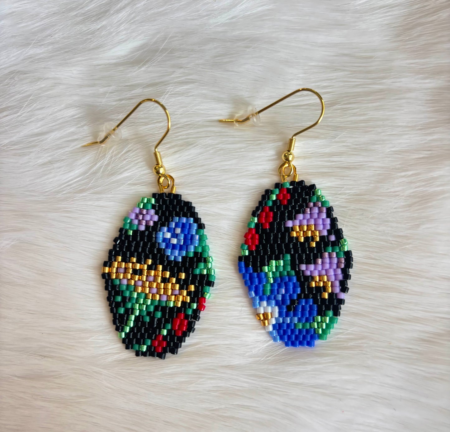 Black Oval Asymmetrical beaded flower earrings
