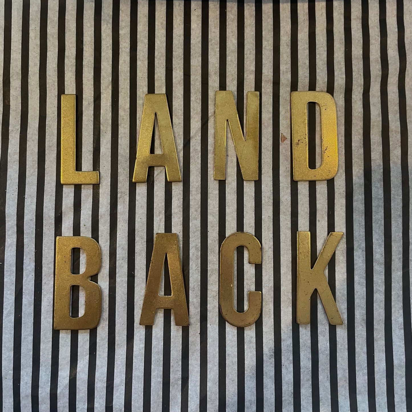 "LAND BACK" Brass Letter Charms Set