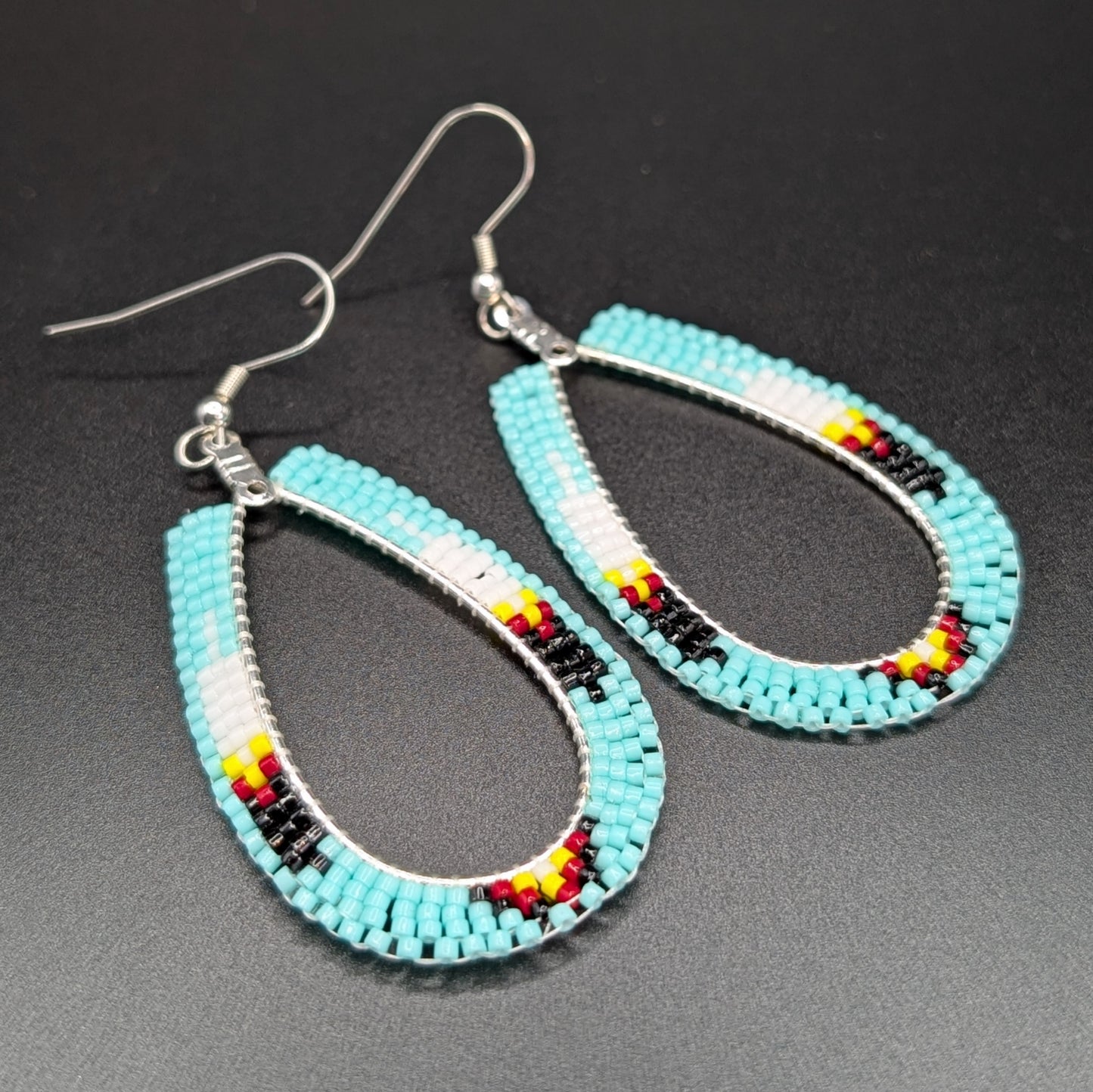 Teal Beaded Tear Drop Dangling Earrings with Feather Motif